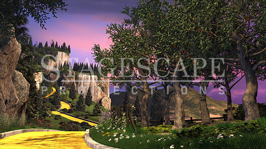 Apple Orchard in Oz scenic projection backdrop for The Wizard of Oz - sunlit apple orchard beside the Yellow Brick Road with waterfall cliffs in the distance. StageScape Projections.