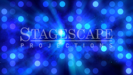 Luminous Light Wall scenic projection backdrop for theatre and dance productions - pulsing bokeh lights with cascading fireworks and colour-shifting celebration effects. StageScape Projections.