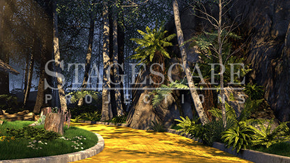 On the Yellow Brick Road scenic projection backdrop for The Wizard of Oz - Yellow Brick Road curving into the Wild Forest, dramatic cliff face with cascading ferns, white birch trees and deep forest canopy. StageScape Projections.