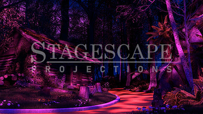 The TinWoodman's Cottage scenic projection backdrop for The Wizard of Oz - dark log cottage with moss and purple flowering boughs, kerbed yellow brick road, stark white birch trees and cascading ferns against deep forest. StageScape Projections.