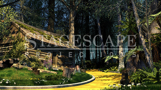 The TinWoodman's Cottage scenic projection backdrop for The Wizard of Oz - dark log cottage with moss and purple flowering boughs, kerbed yellow brick road, stark white birch trees and cascading ferns against deep forest. StageScape Projections.