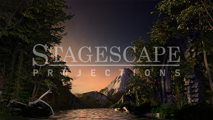 3D-rendered lakeside scenic projection backdrop for Swan Lake ballet, featuring gothic ruin, framed trees and distant mountains.