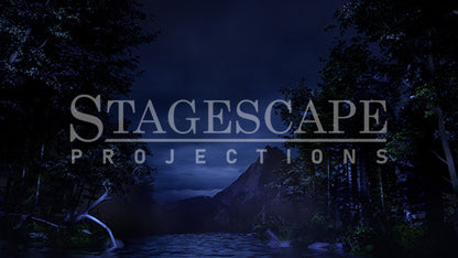 3D-rendered lakeside scenic projection backdrop for Swan Lake ballet, featuring gothic ruin, framed trees and distant mountains.